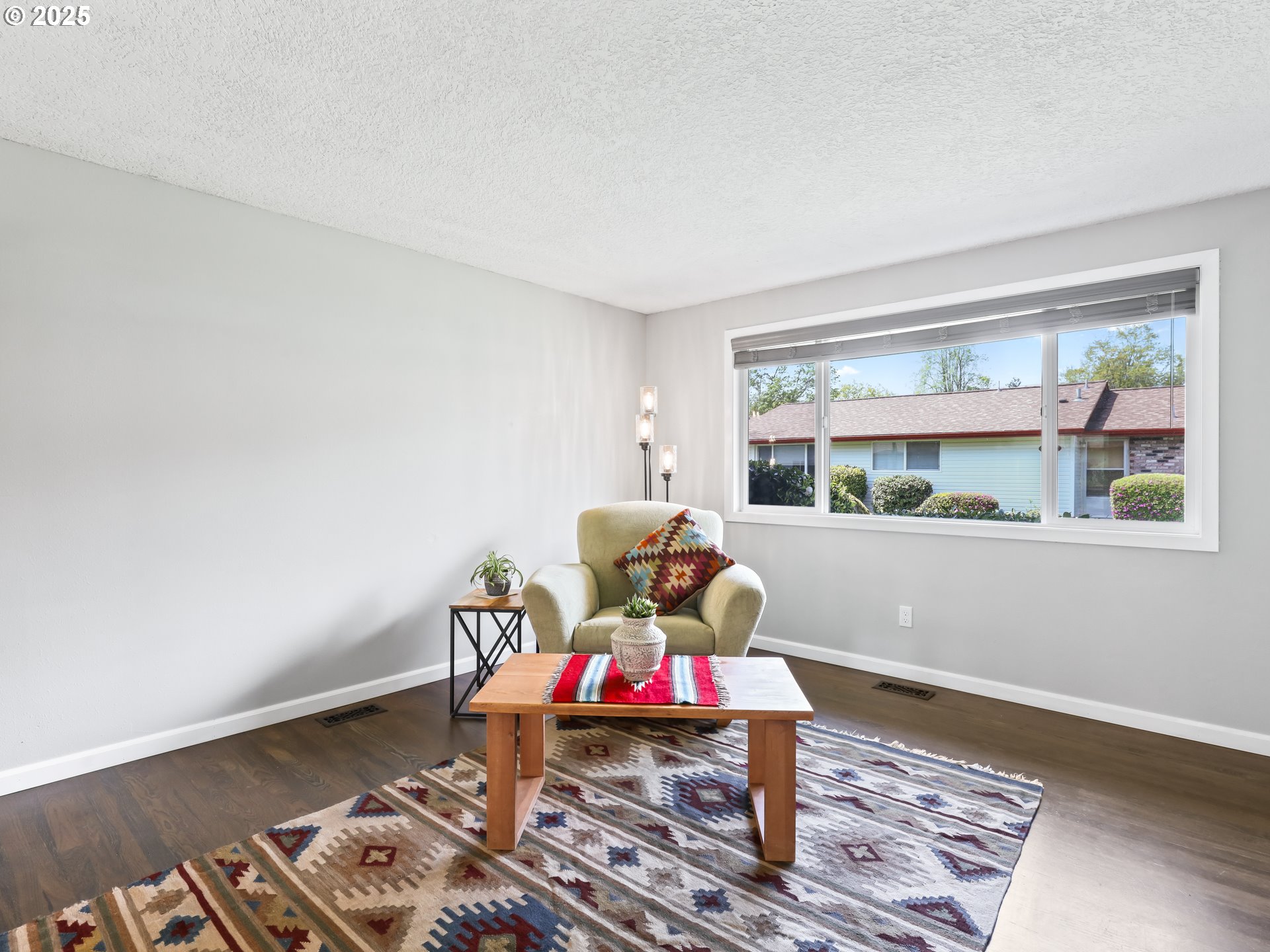 14967 Southeast Grant Court Portland, OR 97233 - Photo 6 of 46 a living room with furniture and a window