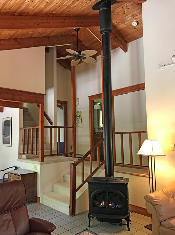 146 Bray Road Buckland, MA 01370 - Photo 14 of 30 a living room with furniture and a lamp