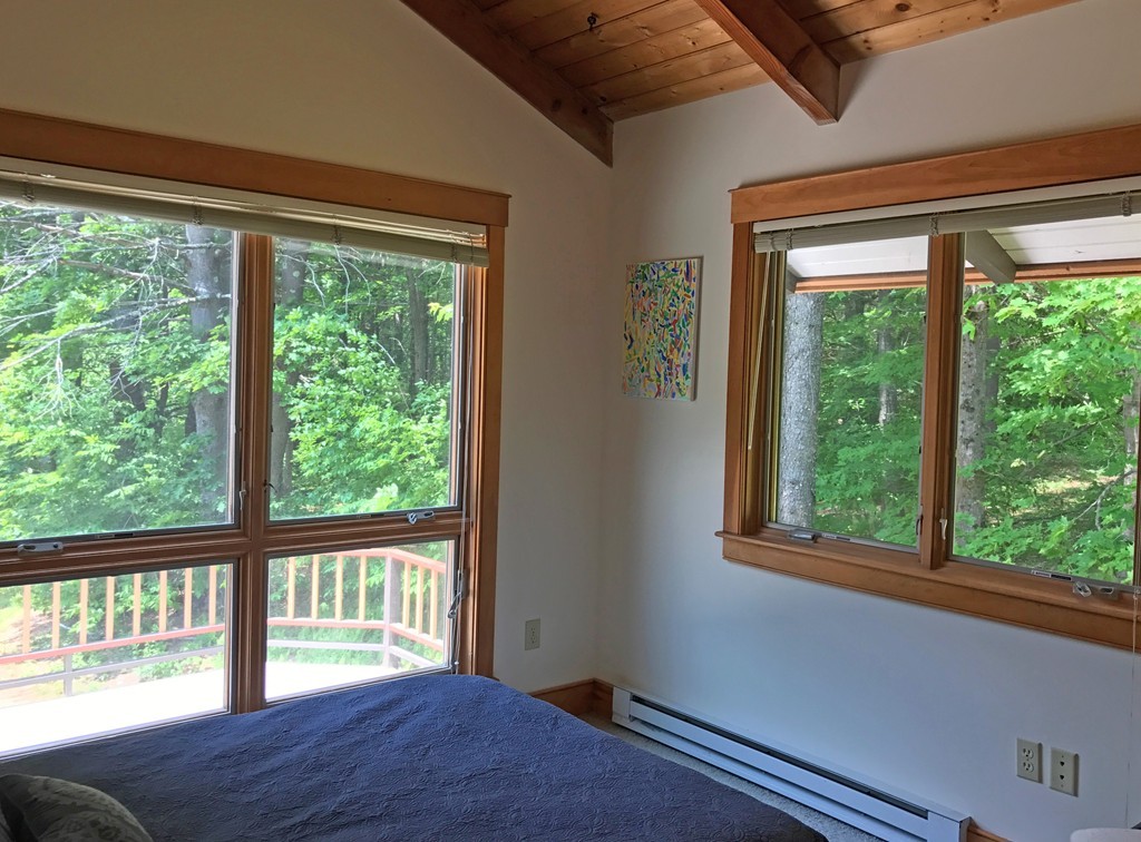 146 Bray Road Buckland, MA 01370 - Photo 24 of 30 a view of a bedroom with wooden floor and front door