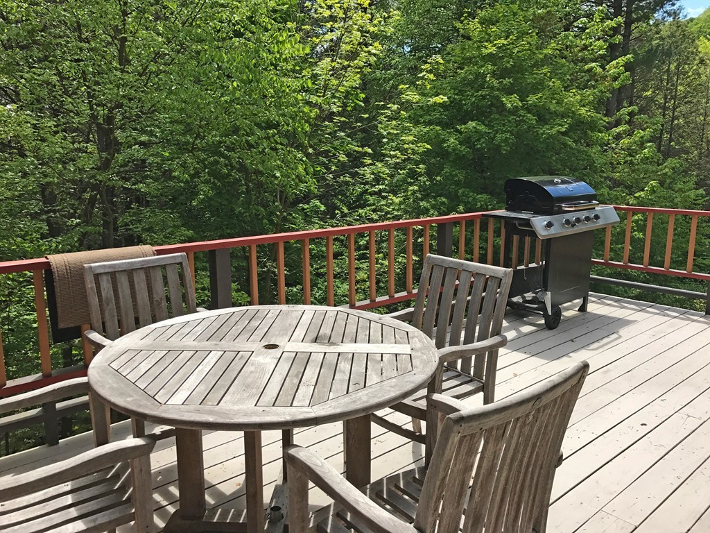 146 Bray Road Buckland, MA 01370 - Photo 27 of 30 a view of balcony with wooden floor and outdoor seating