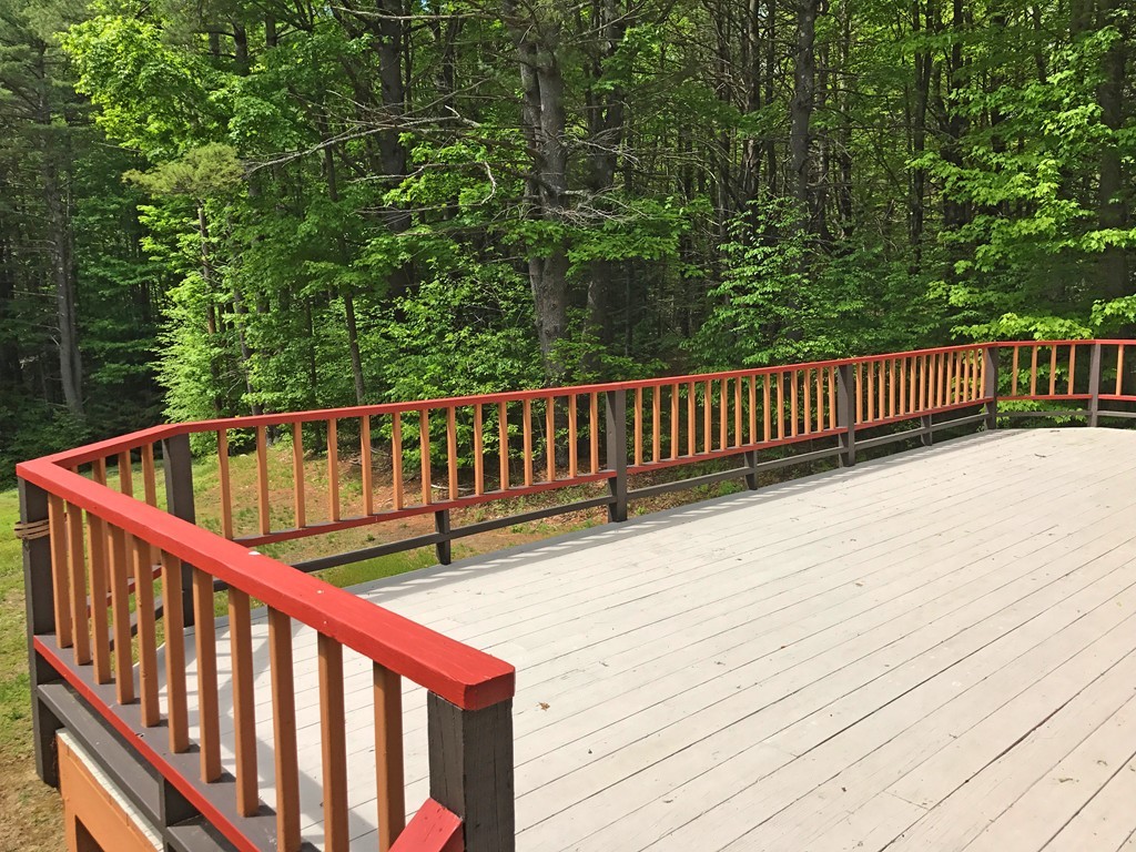 146 Bray Road Buckland, MA 01370 - Photo 28 of 30 a balcony with wooden floor and trees