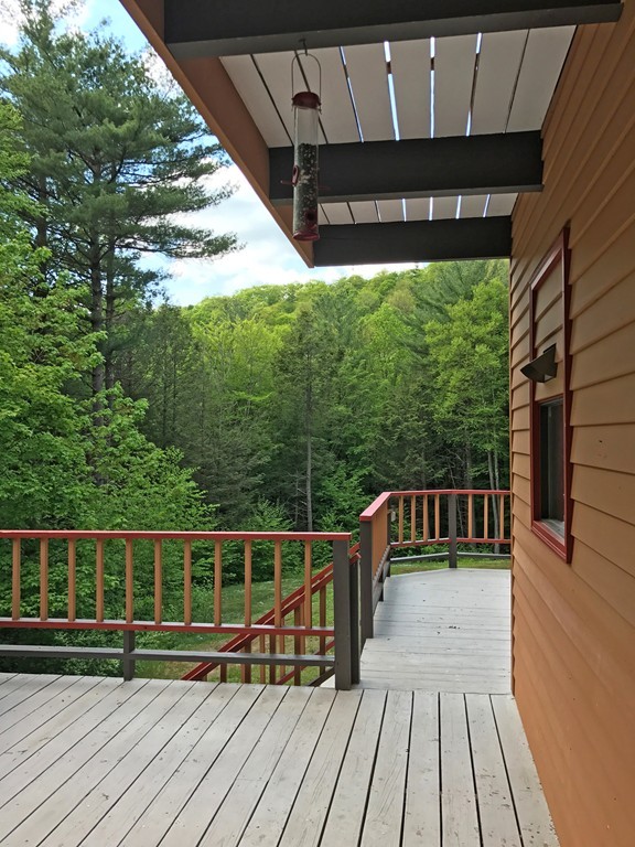146 Bray Road Buckland, MA 01370 - Photo 29 of 30 a view of balcony with wooden floor and fence