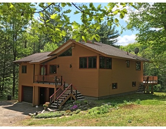 146 Bray Road Buckland, MA 01370 - Photo 3 of 30 a house with trees in the background