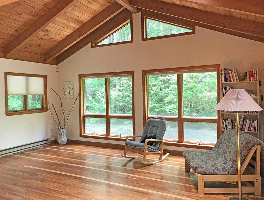 146 Bray Road Buckland, MA 01370 - Photo 8 of 30 a view of a livingroom with wooden floor and furniture