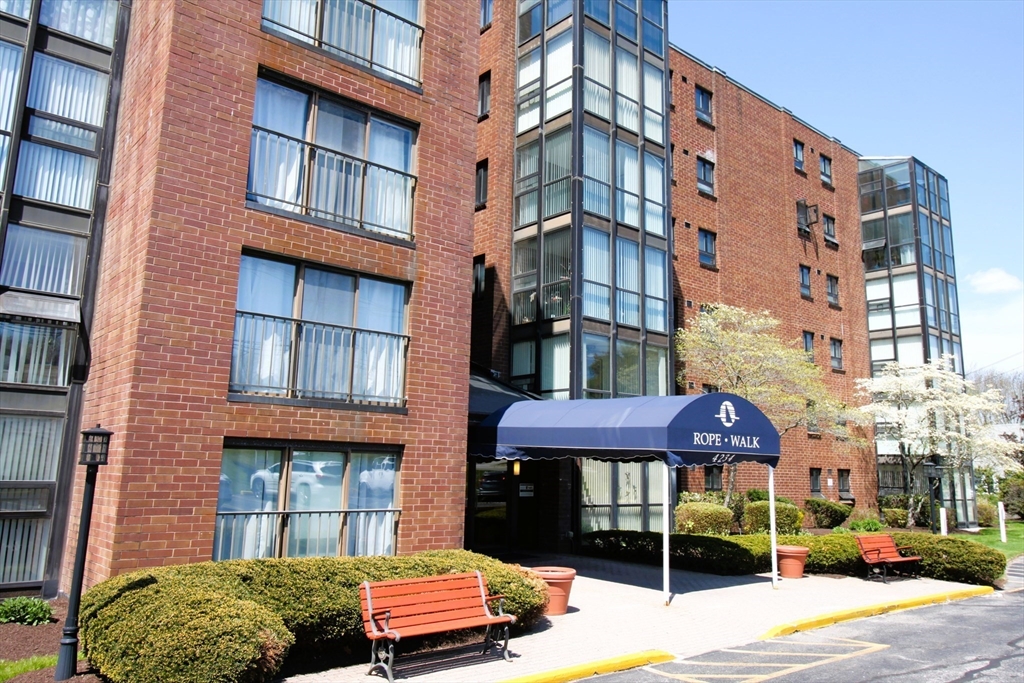 4234 North Main Street, Unit 208 Fall River, MA 02720 - Photo 1 of 27 a building view with a outdoor space and sitting space