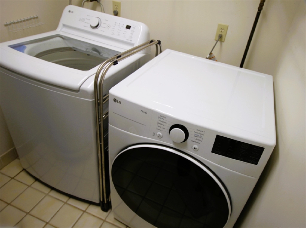 4234 North Main Street, Unit 208 Fall River, MA 02720 - Photo 16 of 27 a utility room with dryer and washer