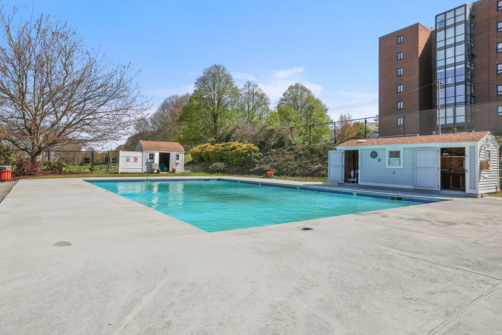 4234 North Main Street, Unit 208 Fall River, MA 02720 - Photo 19 of 27 a view of house with outdoor space and parking