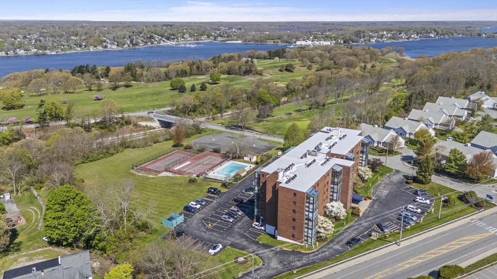 4234 North Main Street, Unit 208 Fall River, MA 02720 - Photo 23 of 27 an aerial view of residential houses with outdoor space