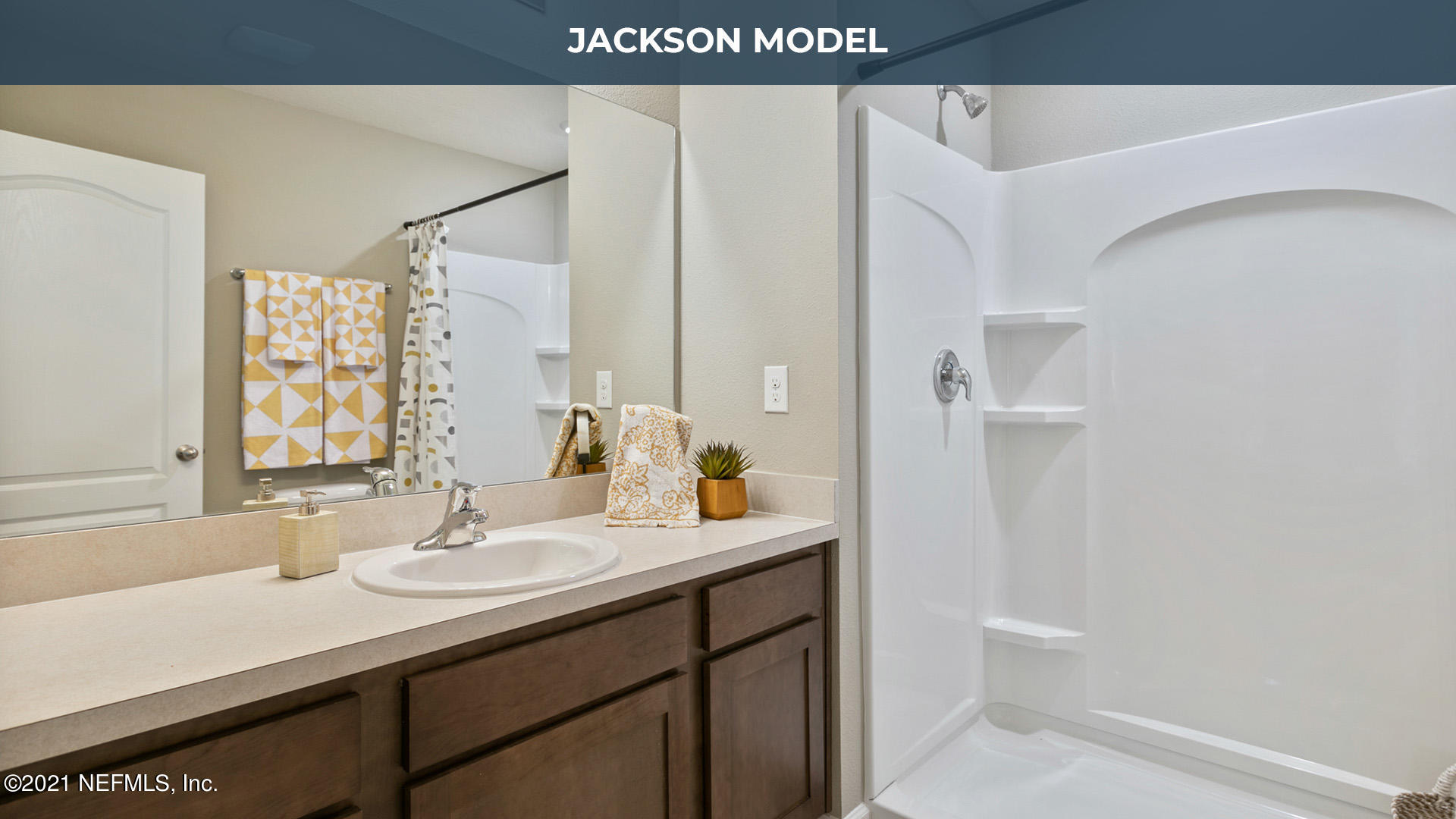 918 Rotary Road Jacksonville, FL 32211 - Photo 8 of 21 a bathroom with a sink and a mirror