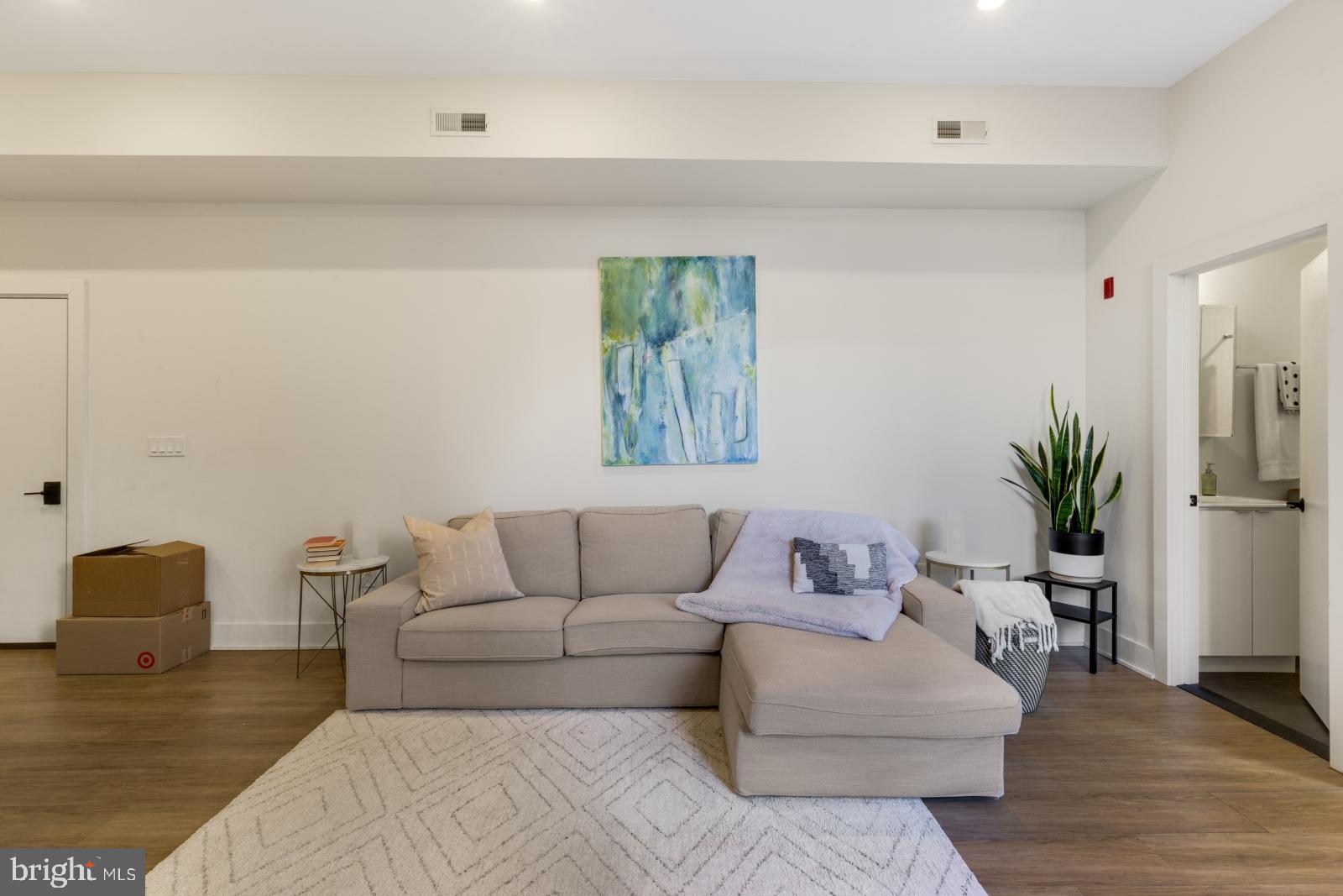 630 Federal Street, Unit 304 Philadelphia, PA 19147 - Photo 11 of 26 a living room with furniture