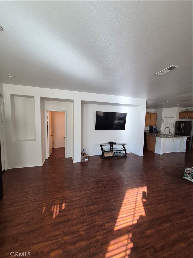 1785 Catania Drive Riverside, CA 92507 - Photo 18 of 47 Living Room. Pictured on wall is a Built in Area for TV or Entertainment area.