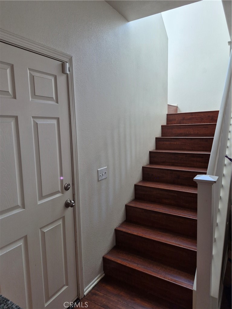 1785 Catania Drive Riverside, CA 92507 - Photo 19 of 47 Stairway to upper Rooms. Door goes to Oversized 2 car Garage