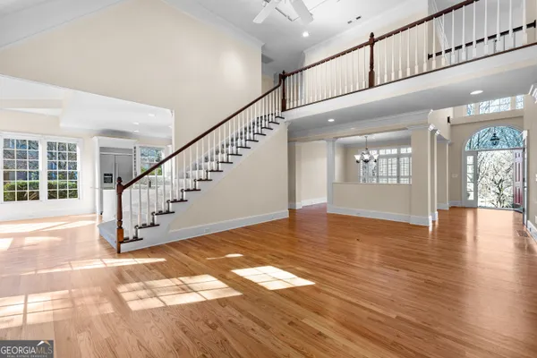 a kitchen with stainless steel appliances granite countertop a stove a sink and a granite counter tops