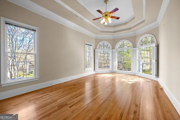 a spacious bathroom with a bathtub and sink