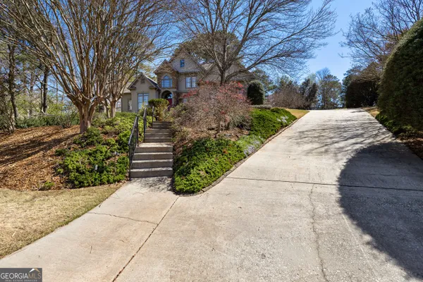 a house with trees in front of it