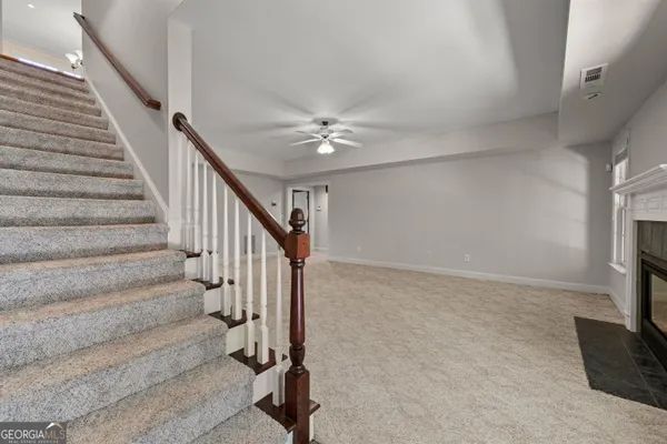 an aerial view of residential house with outdoor space and swimming pool