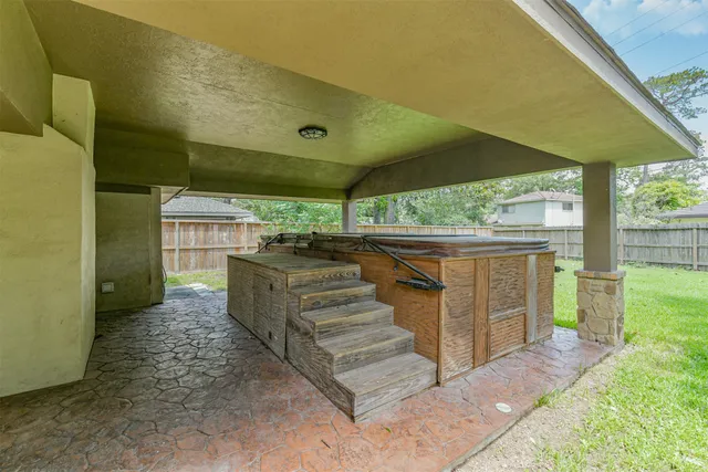 a view of a park with large trees