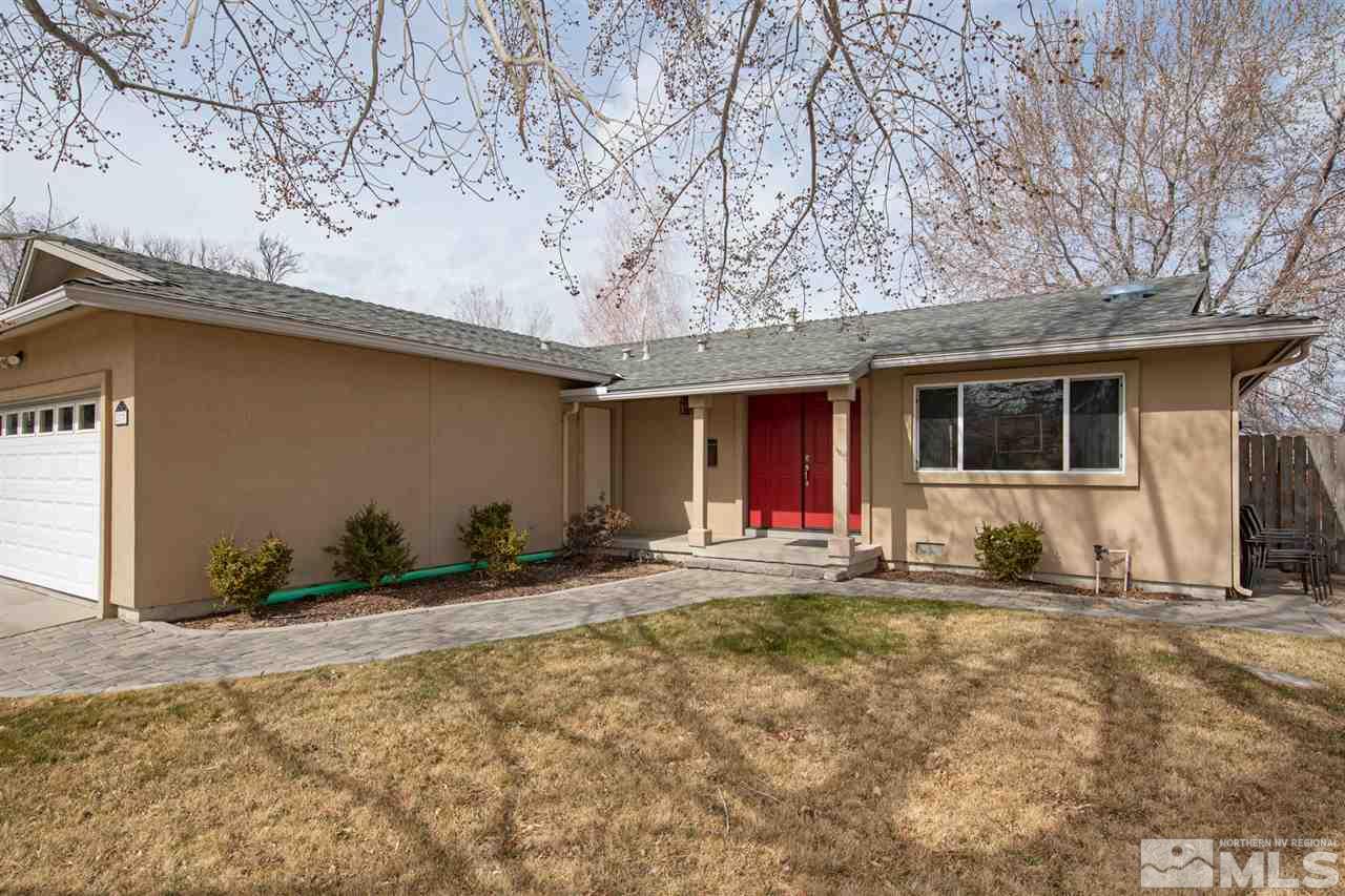 2575 Valmar Place Reno, NV 89503 - Photo 4 of 34 a front view of a house with a yard