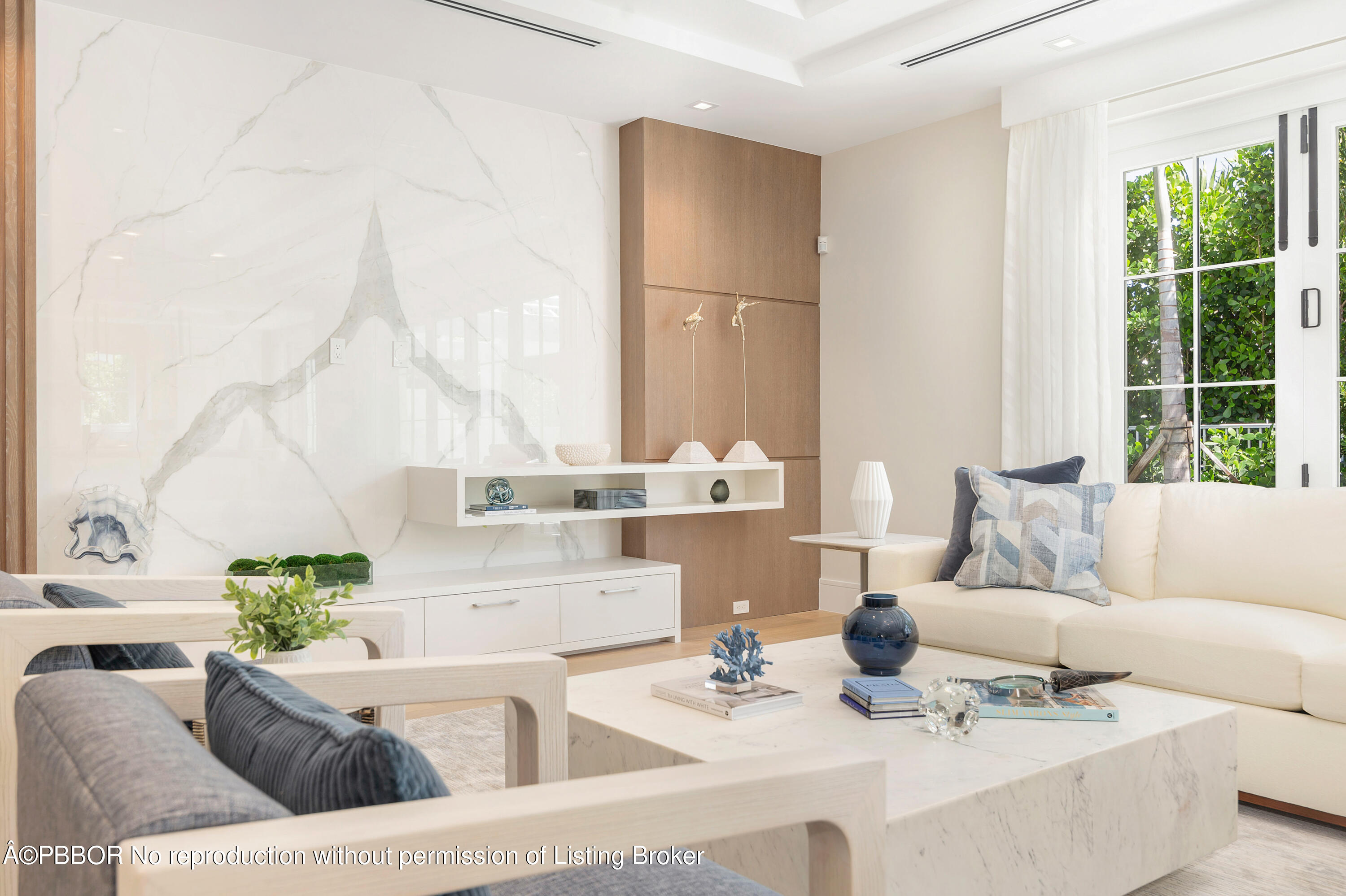 223 Monterey Road Palm Beach, FL 33480 - Photo 15 of 44 a living room with furniture and a large window