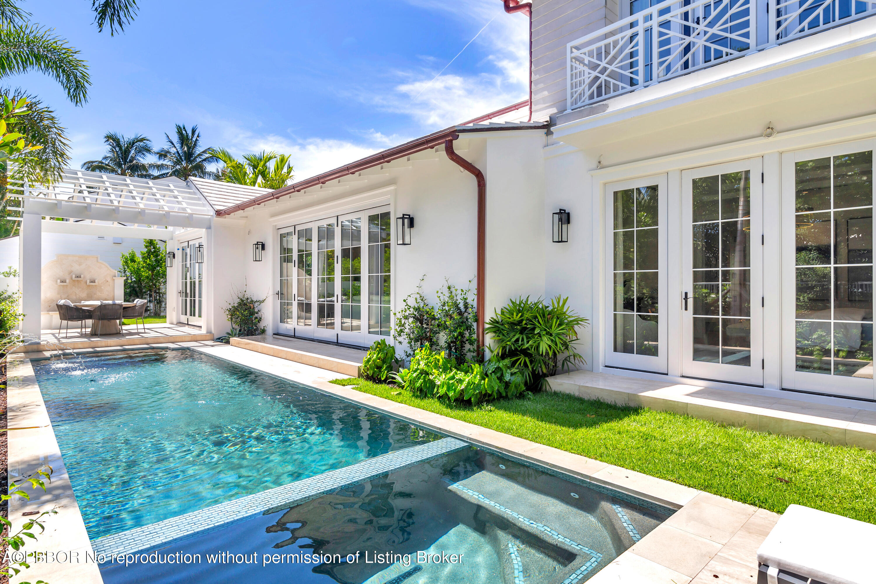 223 Monterey Road Palm Beach, FL 33480 - Photo 38 of 44 a view of a house with backyard and sitting area