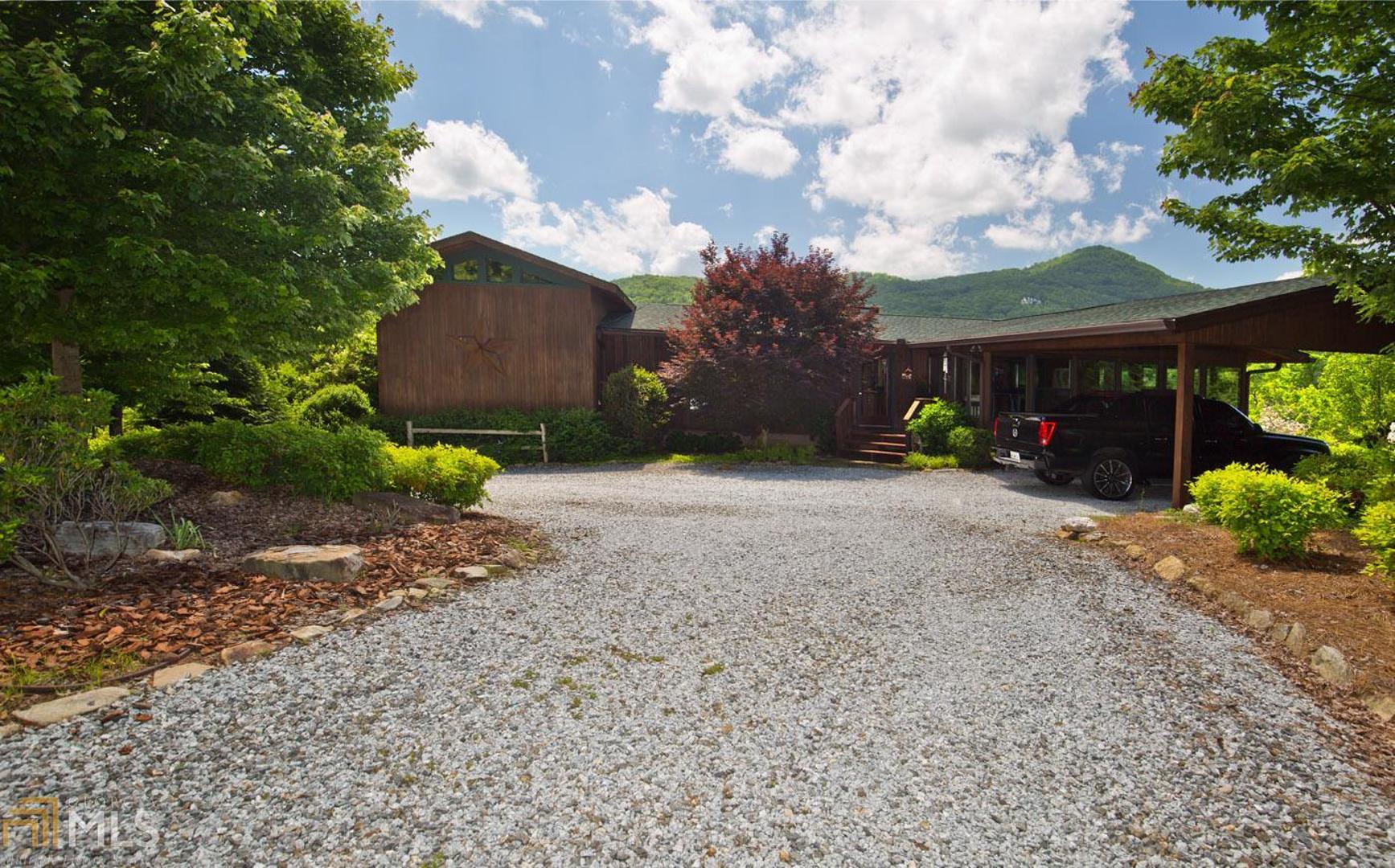 1881 Timpson Cove Road, Unit GP 635 Clayton, GA 30525 - Photo 1 of 1 Circular driveway- Professionally landscaped- 2 car carport- Plenty of parking for family and friends!