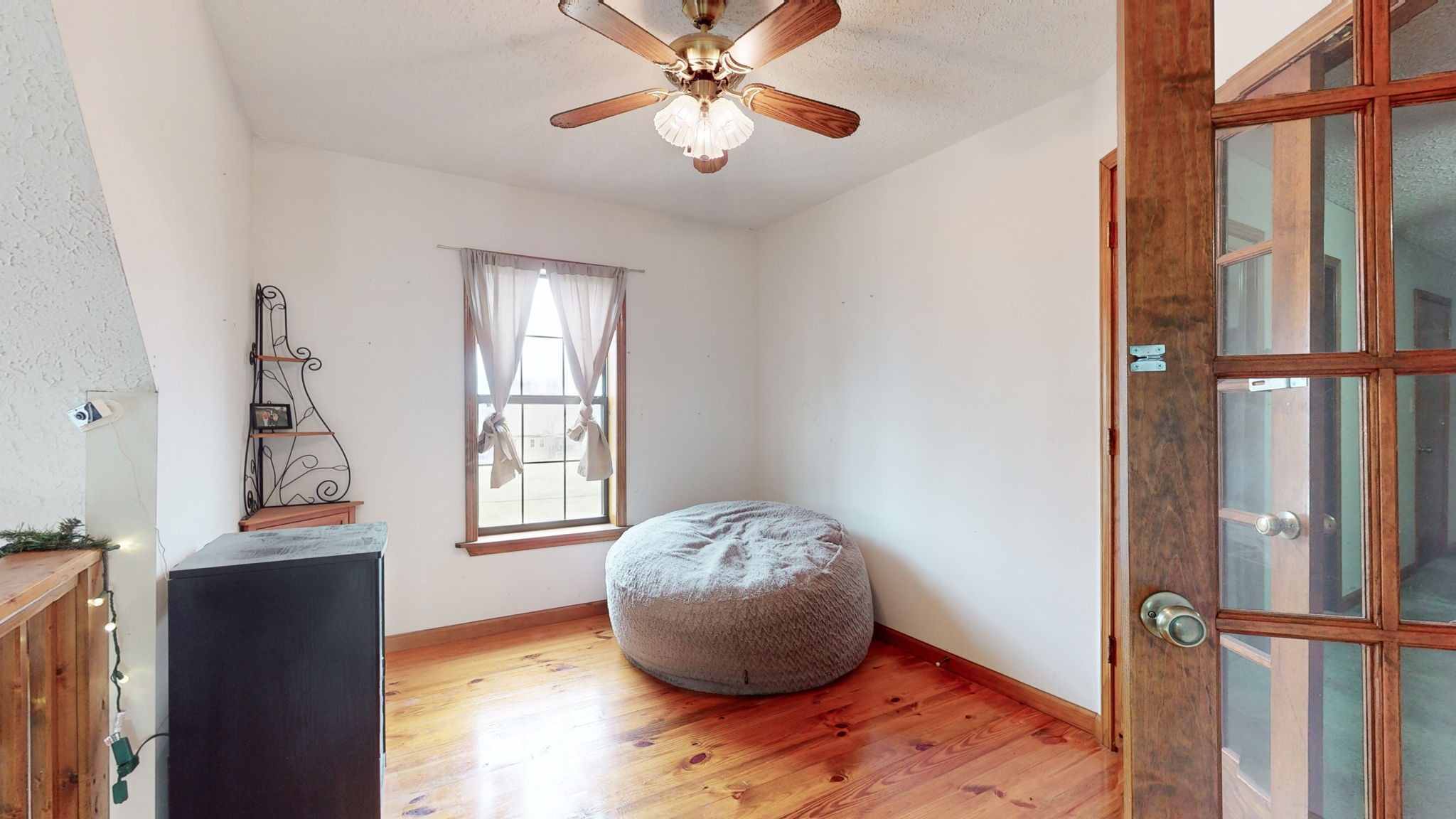 2459 Toler Road Woodlawn, TN 37191 - Photo 14 of 48 a room with window and wooden floor