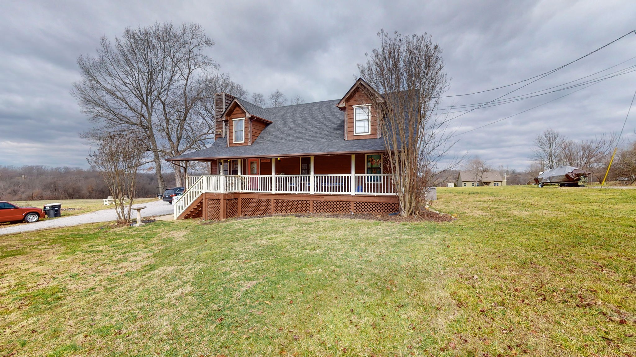 2459 Toler Road Woodlawn, TN 37191 - Photo 2 of 48 a view of a house with a yard
