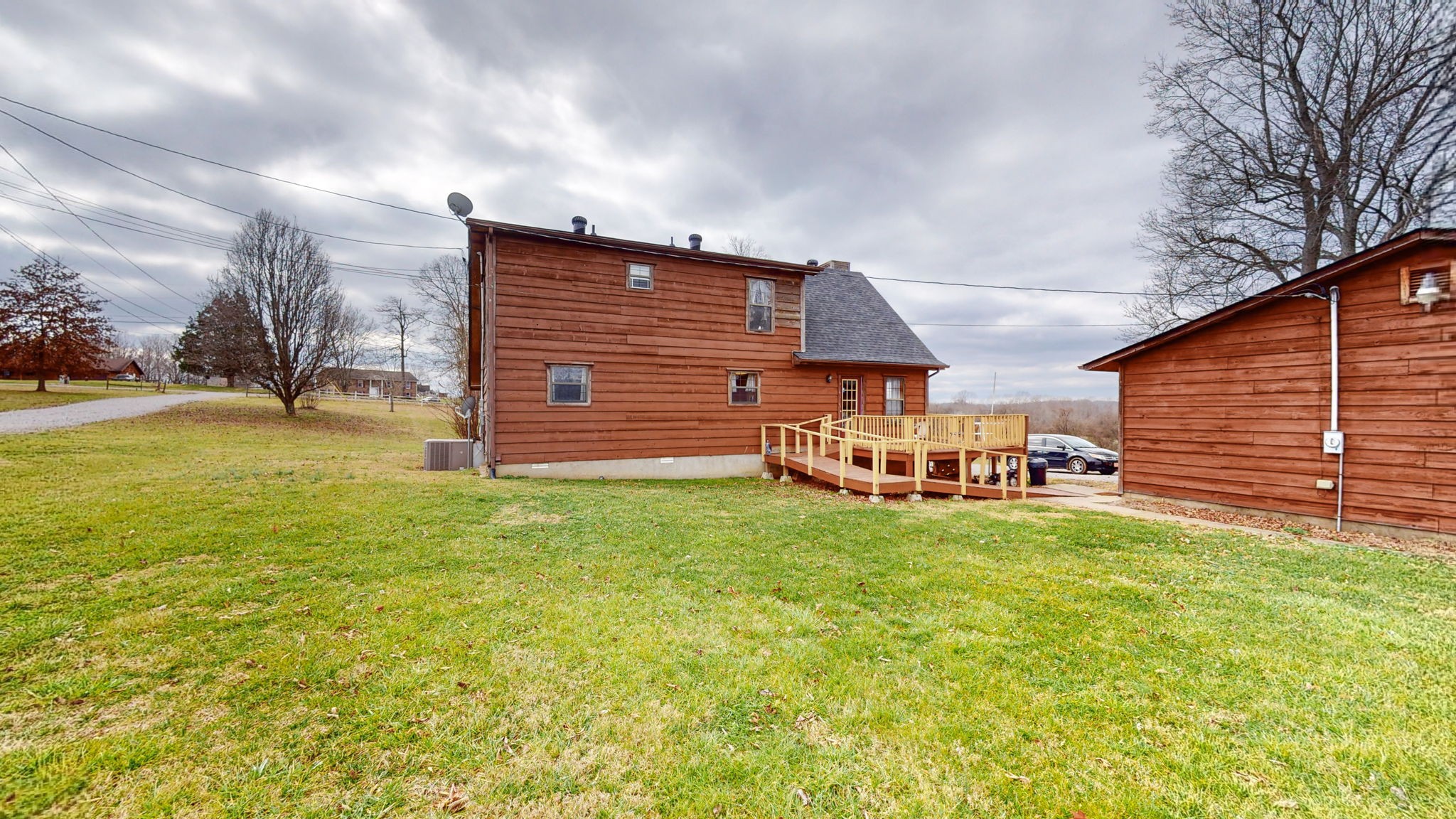 2459 Toler Road Woodlawn, TN 37191 - Photo 26 of 48 a view of a backyard with sitting area