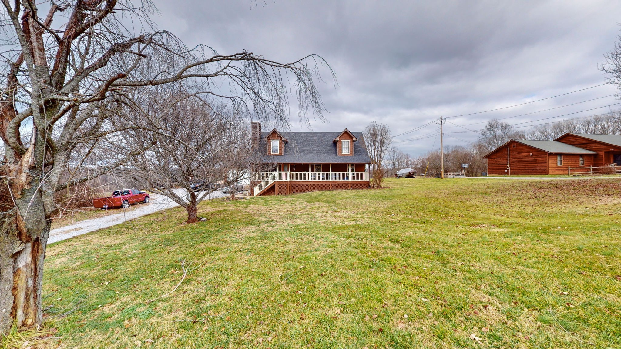 2459 Toler Road Woodlawn, TN 37191 - Photo 3 of 48 a house view with swimming pool in front of it