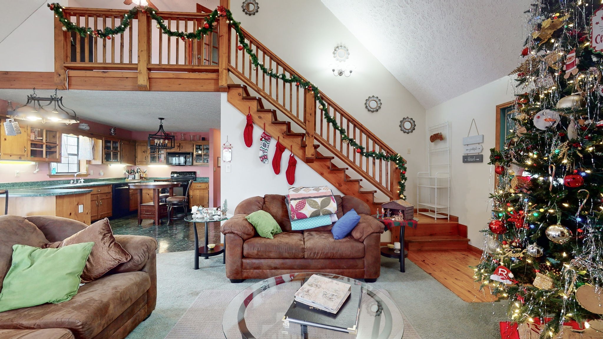 2459 Toler Road Woodlawn, TN 37191 - Photo 5 of 48 a living room with furniture and a potted plant