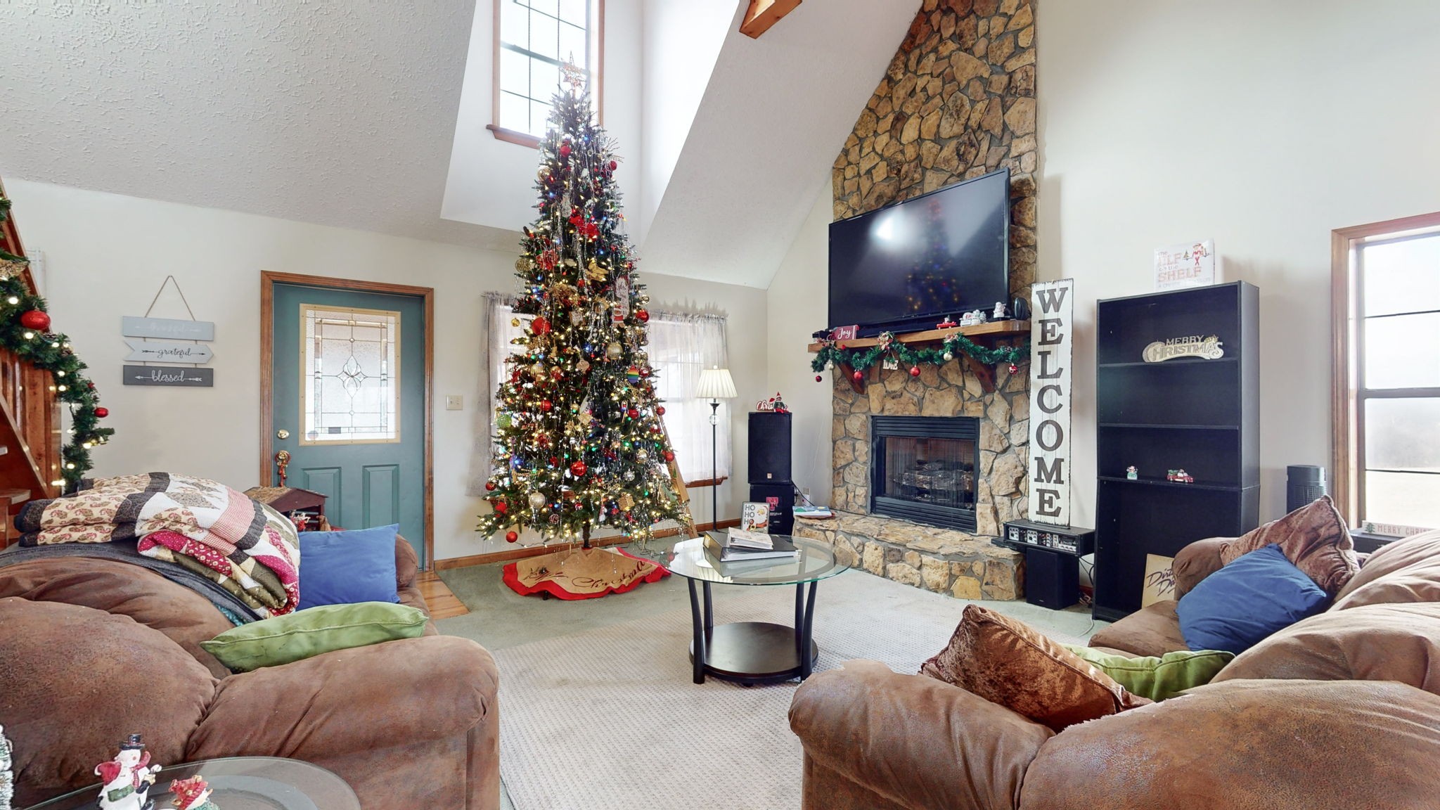 2459 Toler Road Woodlawn, TN 37191 - Photo 7 of 48 a living room with furniture and potted plants