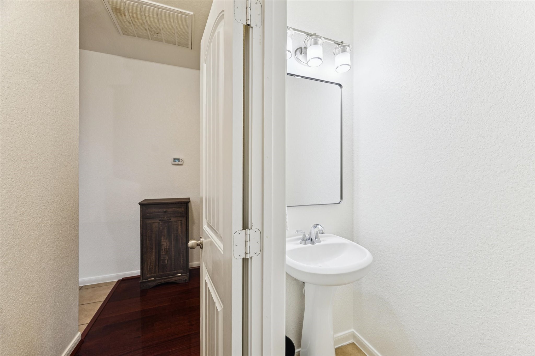 191 Maple Grove Drive Conroe, TX 77384 - Photo 16 of 27 First floor powder room.