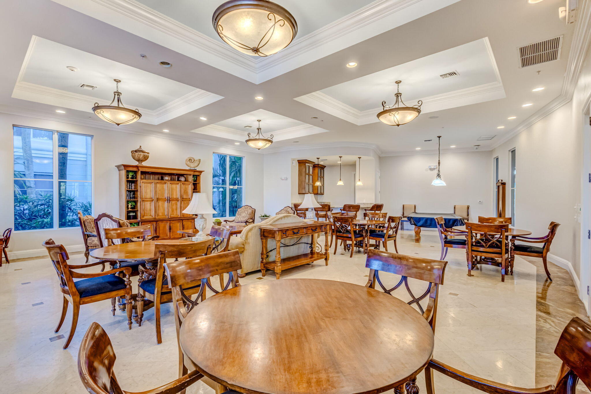 1660 Renaissance Commons Boulevard, Unit 2627 Boynton Beach, FL 33426 - Photo 28 of 32 an outdoor space with lots of white furniture