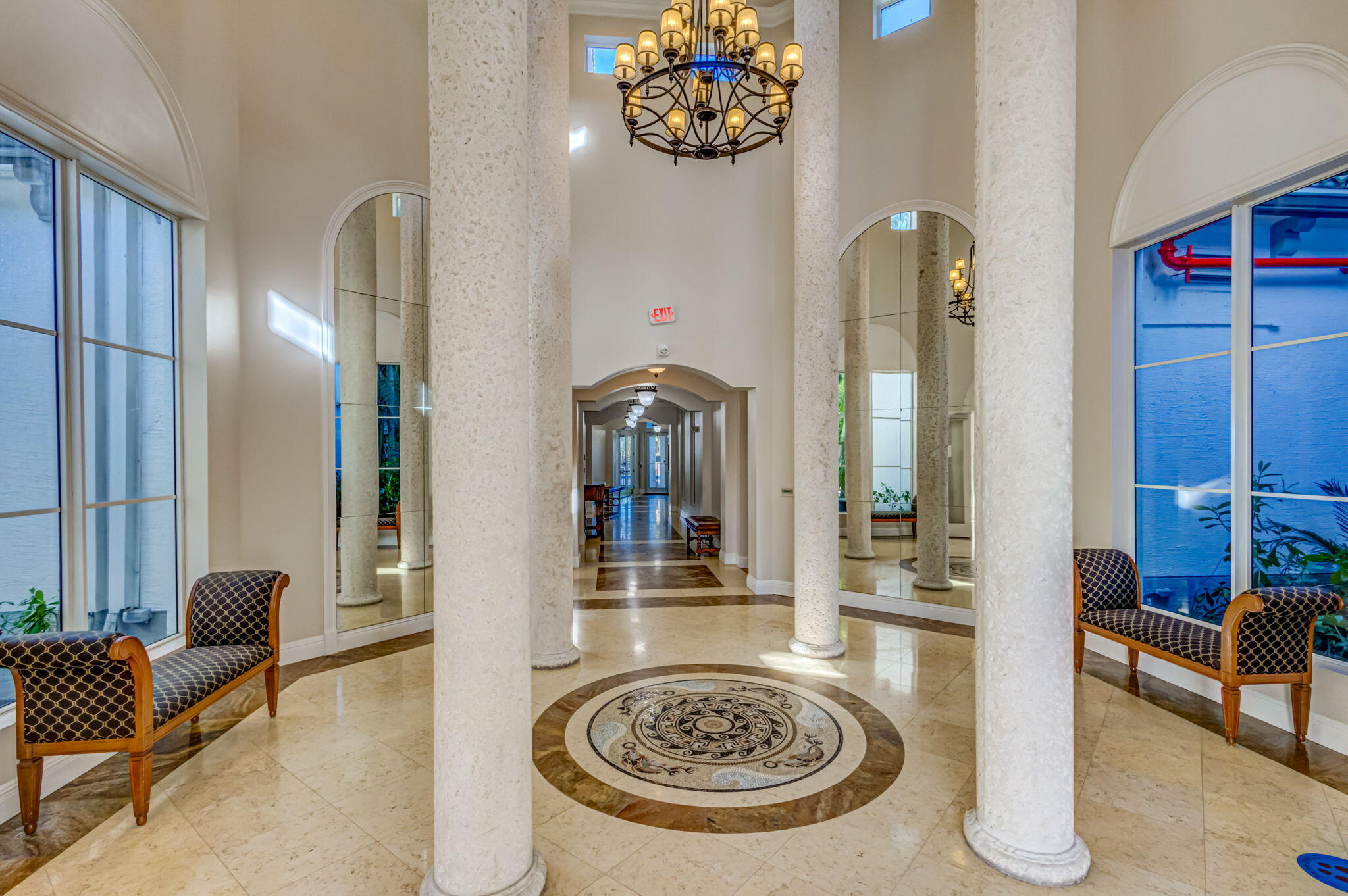 1660 Renaissance Commons Boulevard, Unit 2627 Boynton Beach, FL 33426 - Photo 29 of 32 a view of a livingroom with furniture and front door