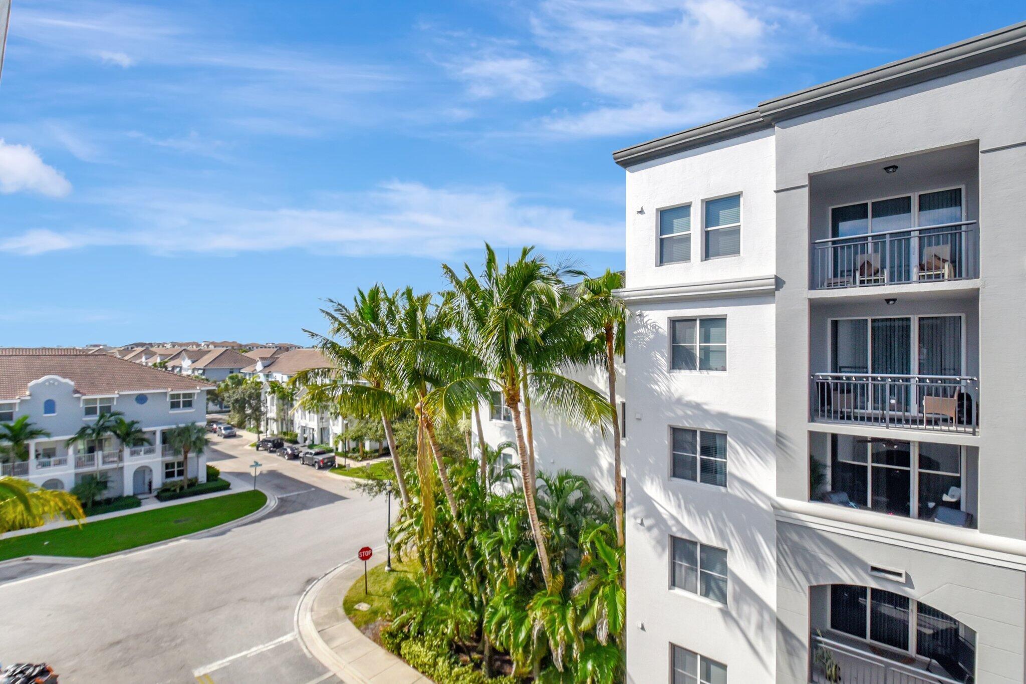 1660 Renaissance Commons Boulevard, Unit 2627 Boynton Beach, FL 33426 - Photo 30 of 32 a front view of a multi story building