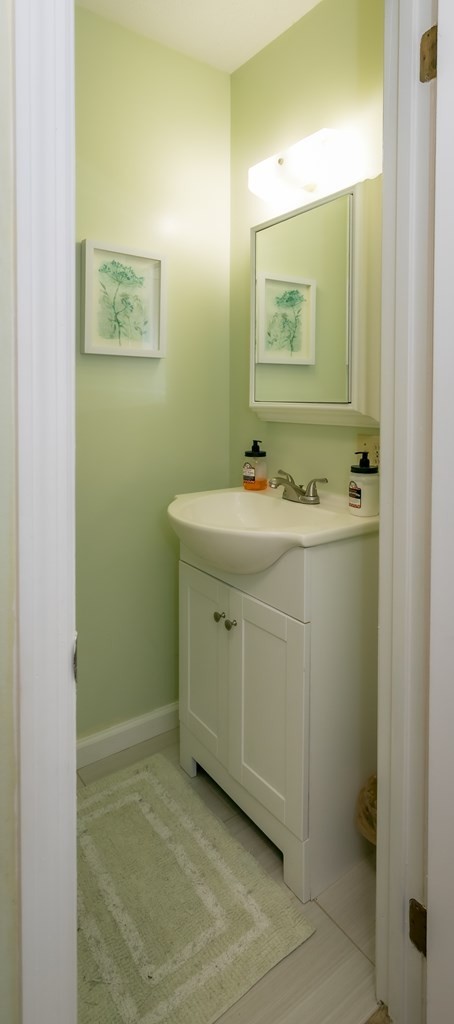 3108 Fortenberry Road Kodak, TN 37764 - Photo 30 of 47 a bathroom with a sink and a mirror