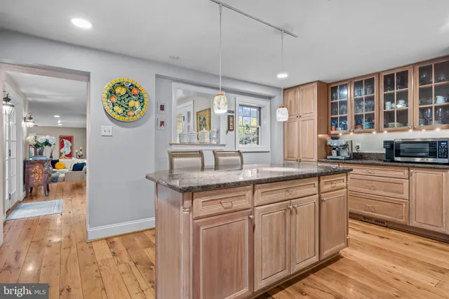 a view of a dining room with furniture and window