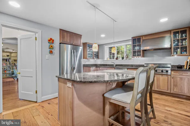 a view of a hallway with windows