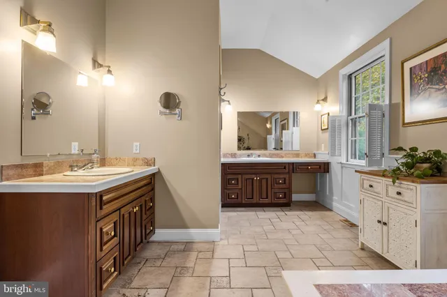 a view of yard with swimming pool and green space