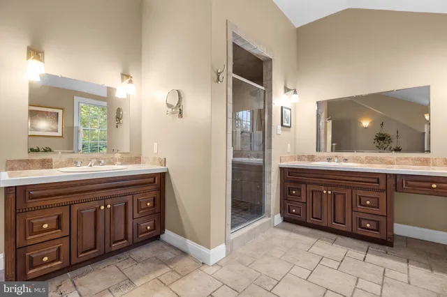 a view of deck with table and chairs and wooden floor