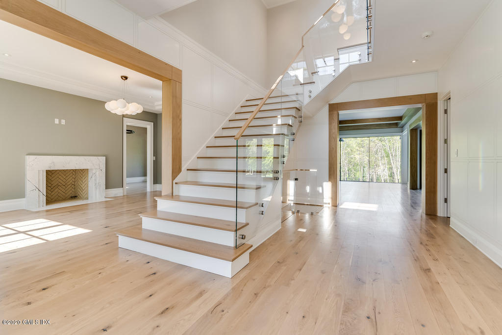 180 Stanwich Road Greenwich, CT 06830 - Photo 3 of 19 a view of entryway and hall with wooden floor