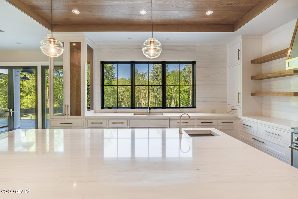 180 Stanwich Road Greenwich, CT 06830 - Photo 8 of 19 a view of an entryway with wooden floor and door