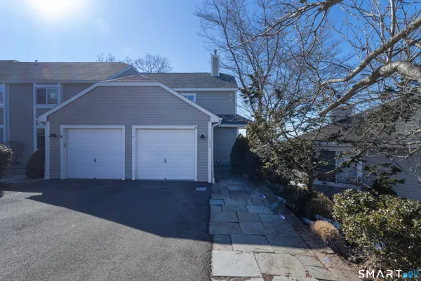 a house with trees in front of it