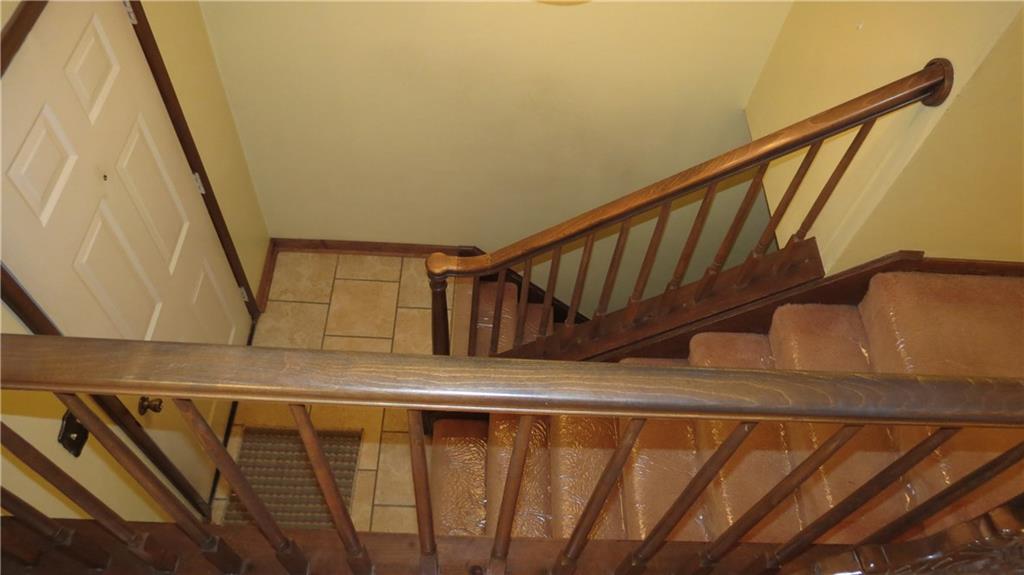 116 Julia Street Rices Landing, PA 15357 - Photo 15 of 25 ENTRY WAY, WOOD RAILING, OPEN LOOK.
