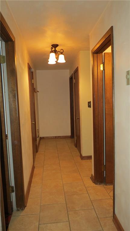 116 Julia Street Rices Landing, PA 15357 - Photo 19 of 25 HALLWAY DOWNSTAIRS, CERAMIC FLOORS...