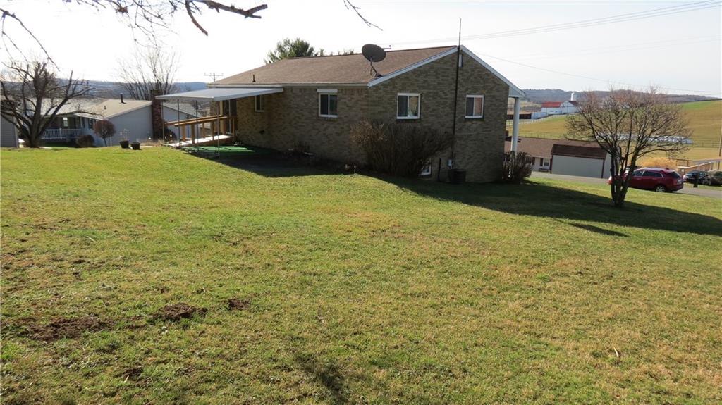 116 Julia Street Rices Landing, PA 15357 - Photo 3 of 25 Rear of Home, View of the Farm in the Background.