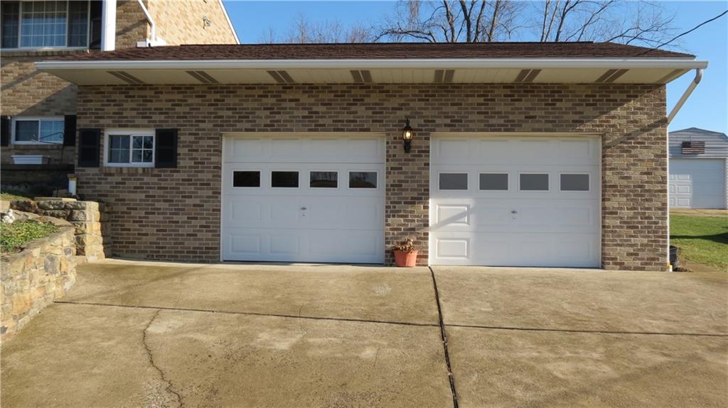 116 Julia Street Rices Landing, PA 15357 - Photo 24 of 25 HUGE GARAGE, WIDE CONCRETE DRIVEWAY...