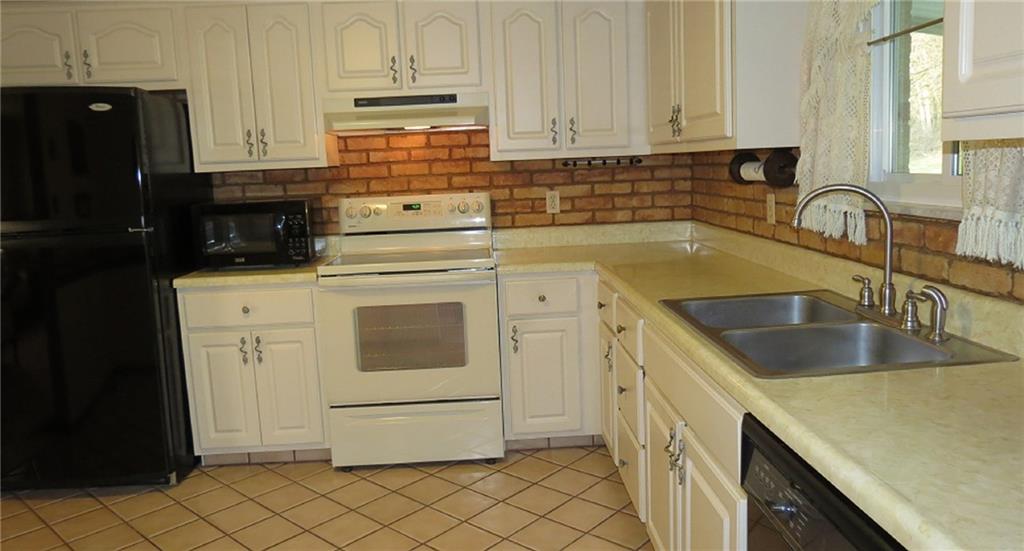 116 Julia Street Rices Landing, PA 15357 - Photo 7 of 25 CLEAN... NICE SIZE KITCHEN, ALL APPLIANCES STAY...