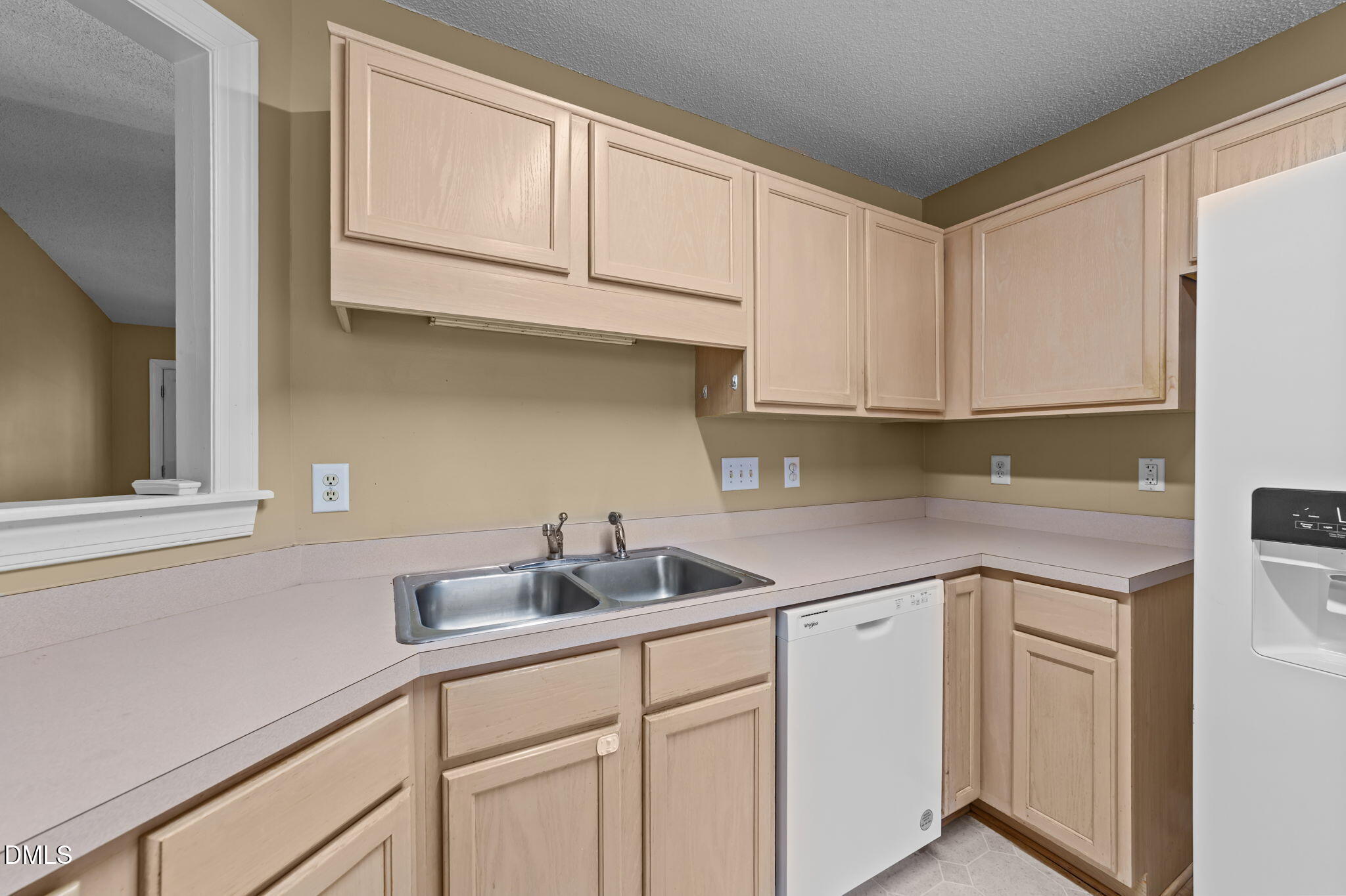 624 Harris Point Way Wake Forest, NC 27587 - Photo 14 of 38 a kitchen with white cabinets and a sink