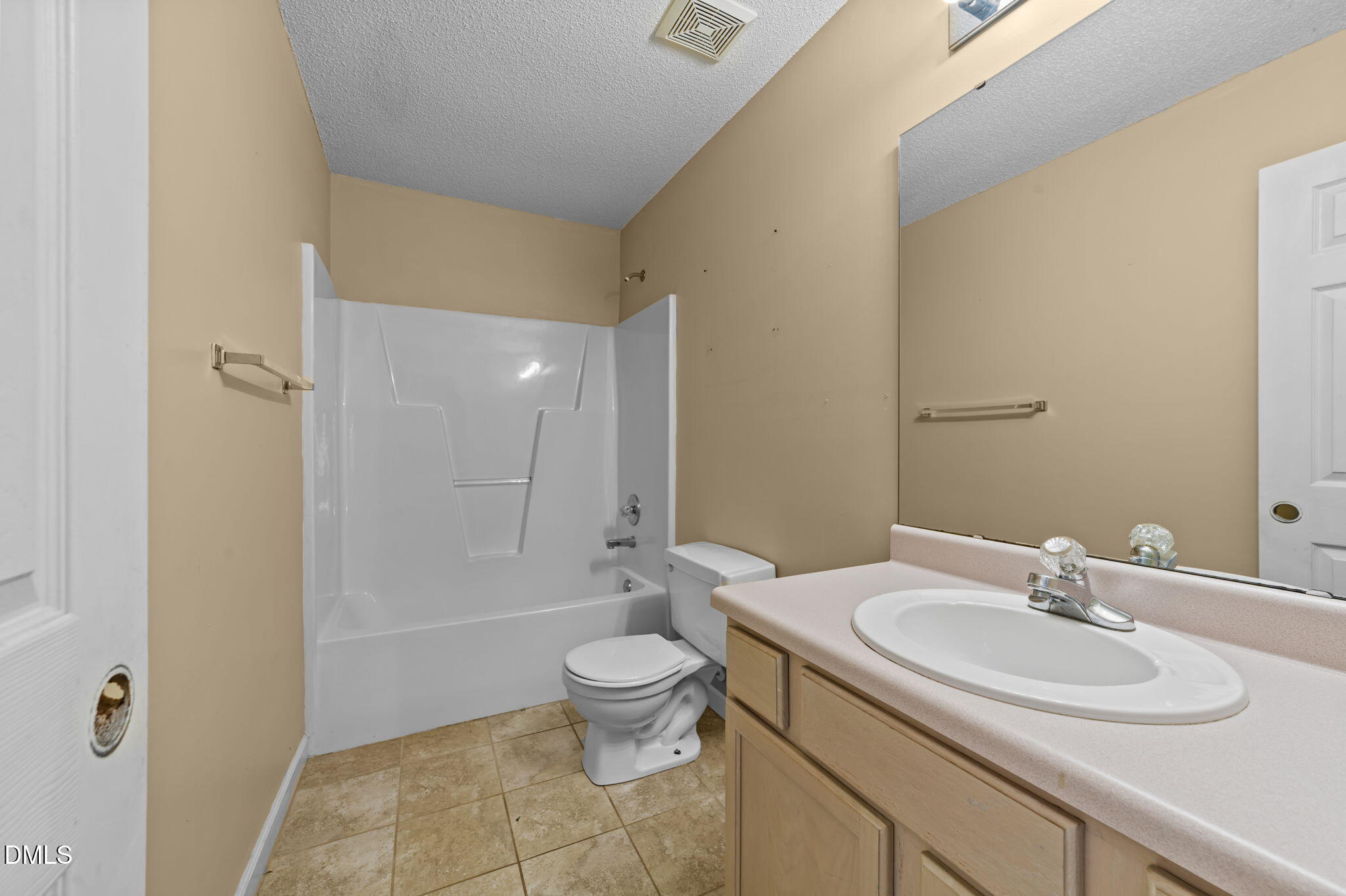 624 Harris Point Way Wake Forest, NC 27587 - Photo 26 of 38 a bathroom with a granite countertop sink toilet and shower